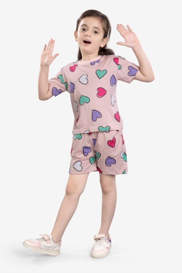 Light pink cotton corset for kids aged 2 to 6, featuring heart prints and soft, child-friendly design.